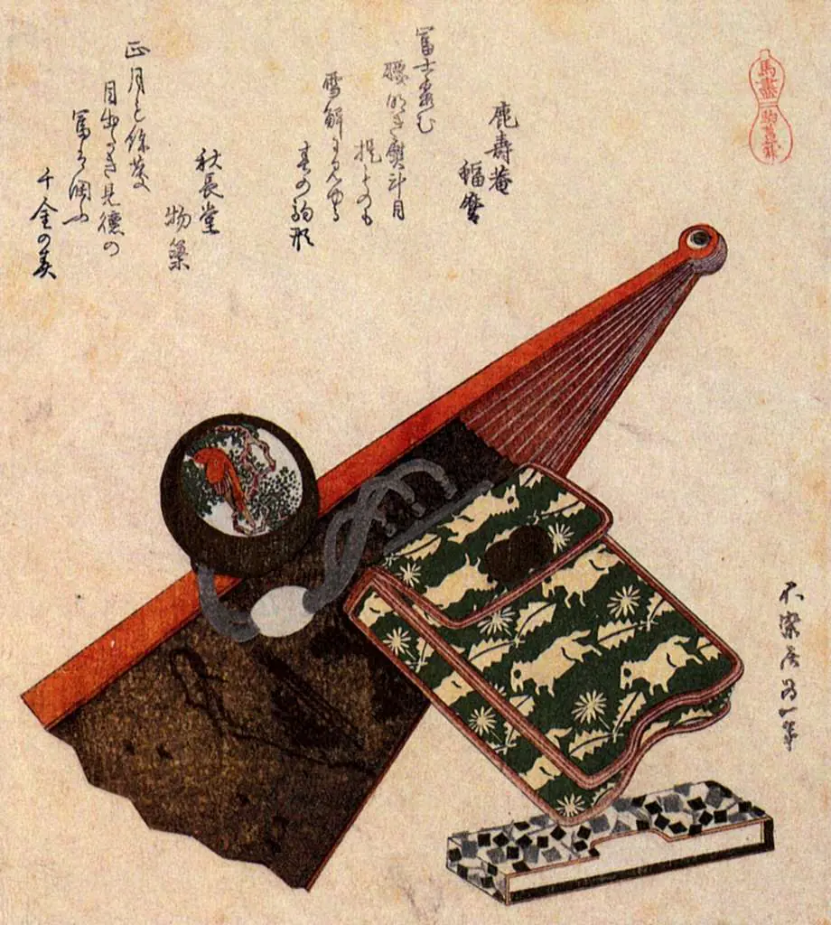 Japan Art: A Leather Pouch With Kagami Netsuke Ona Partly Opened Fan